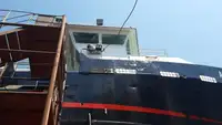 Ọkọ omi ti o mu ọja fún tà