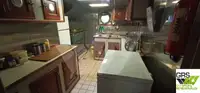 Ọkọ omi ti o mu ọja fún tà