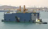 Dọki tí ó ń gbà omi fún tà