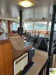 Ọkọ omi ti o mu ọja fún tà