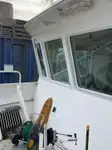 Ọkọ̀ ojú omi ìrìn-àjò tí ó mú àwọn ọkọ̀ fún tà