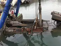 Ọkọ̀ ojú omi tí ó mú ìdọ̀tí fún tà
