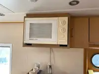 Ọkọ̀ ojú omi tí ó mú ìdọ̀tí fún tà
