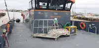 Ọkọ̀ tí ó ṣiṣẹ́ ní ibi tí wọn ṣe àgbàdí fún tà